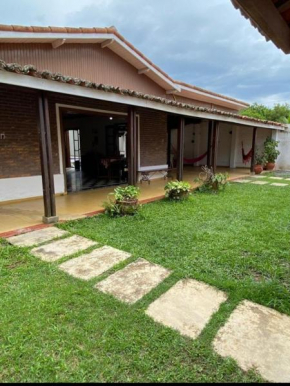 Casa aconchegante com piscina a 30 metros da praia